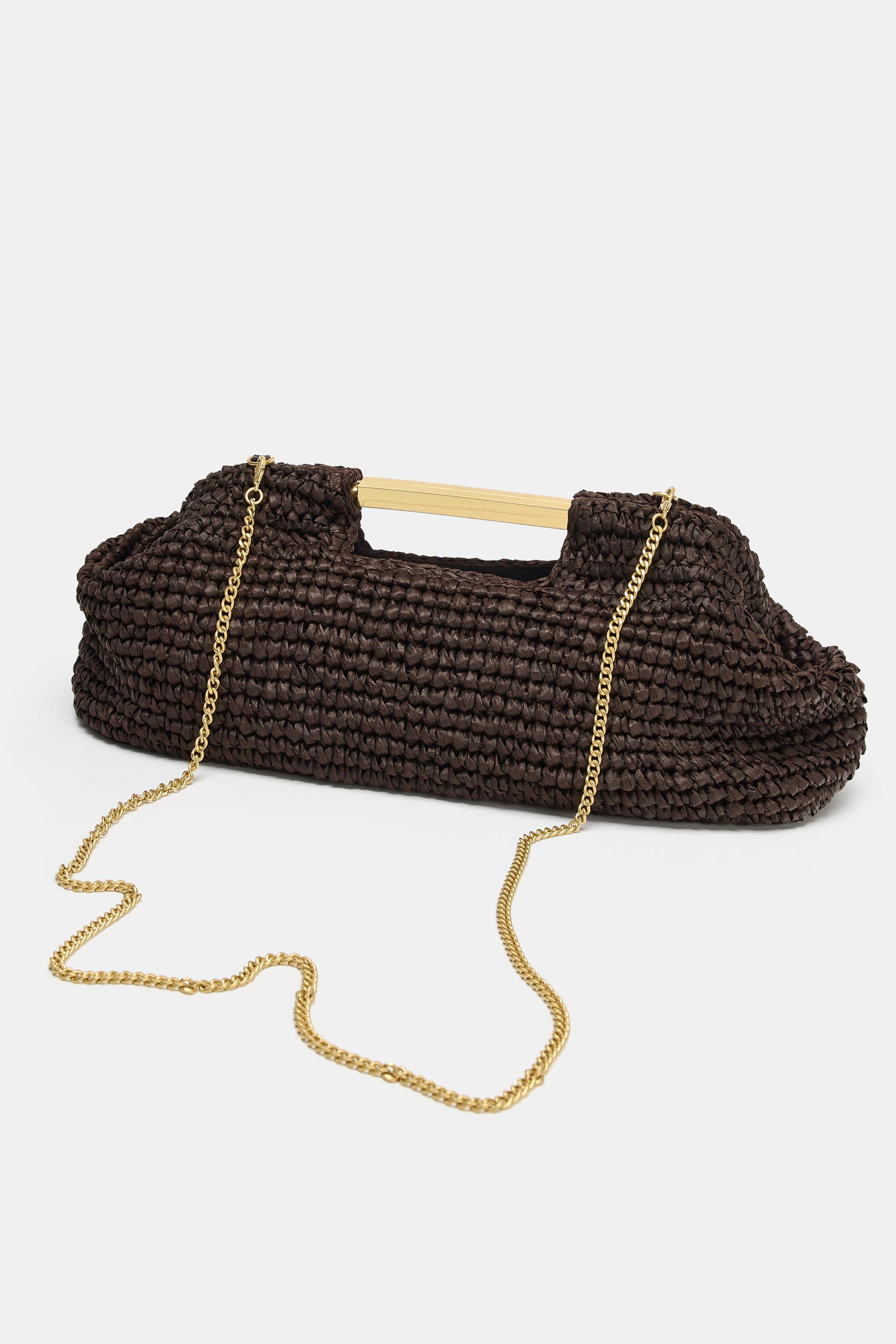 Clutch with a woven exterior. Rigid handle and removable chain crossbody strap. Interior pocket. ... | Zara US