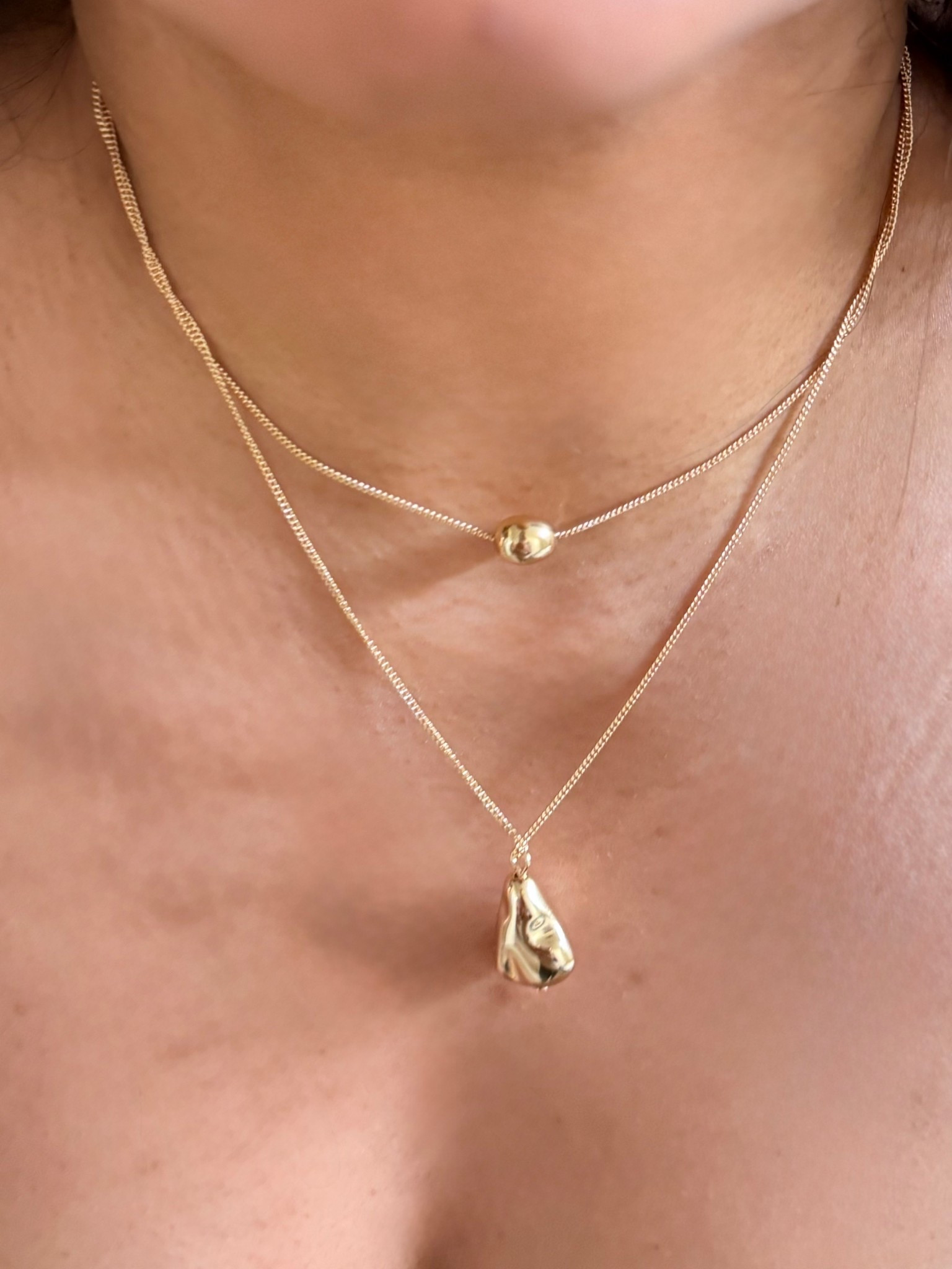 Layered gold but make it effortless ✨💛
Obsessed with this minimal double-necklace moment — the dainty choker bead + organic drop pendant is giving everyday luxe. Perfect for date nights, brunch, or elevating a basic tee.

Such a timeless piece you’ll wear on repeat 🤍
Linked in my LTK under Jewelry ✨

#LTKStyle #LTKJewelry #LayeredNecklaces #EverydayGold #MinimalStyle #JewelryFinds #GoldLayering #LTKUnder100

#LTKValentine #LTKootd #LTKNYFW