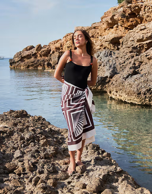 4th & Reckless x Luana Barron tie side maxi beach sarong skirt in brown tile print | ASOS | ASOS (Global)