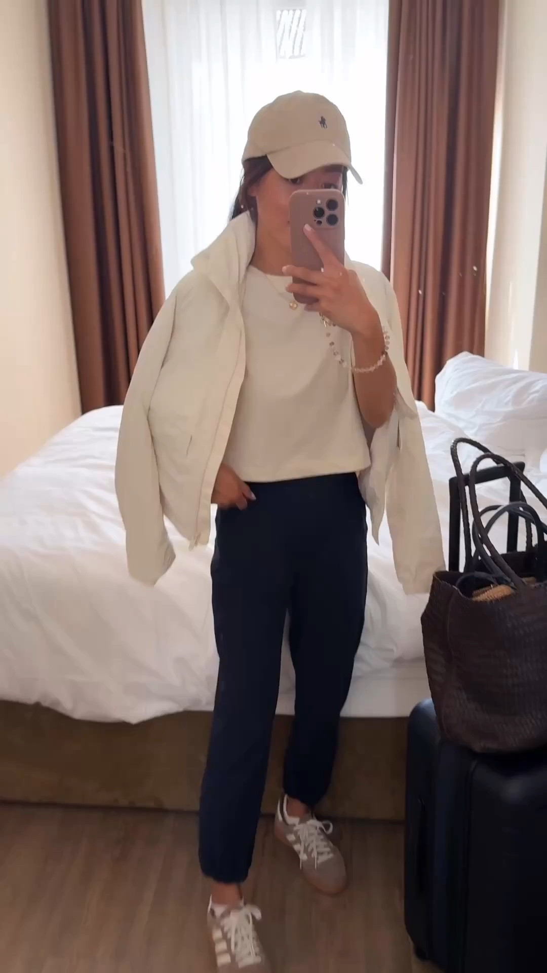 Adidas 👟 back in stock! A few rain-resistant travel and active staples I’ve recommend for year, plus linked lulu sale items!

• lululemon Adapted State High-Rise Cropped Jogger pants in true navy size 2 - I’m 5 feet tall in the 23” inseam for a cropped length that hits above my ankle. 

For waist fit reference I’m usually a 24 in jeans for other brands, and always buy lululemon size 2. 

• lululemon Always Effortless Classic-Fit Jacket size 2, best active jacket that is water resistant , petite friendly, and can be cinched at the waist 

• lululemon All Yours Organic Cotton Cropped T-Shirt xxxs but I could’ve easily done xxs for a less shrunken fit. Soft but has some boxy structure and the length is great for still showing the waistline but doesn’t show my skin

• Adidas sneakers 5 - Runs big. My most comfortable adidas sneakers. Ppl suggest to go half size down

•Polo hat

• Away suitcase in the “Bigger” expandable carry on size that’s been great for travels 

• Madewell woven bag - my exact color is sold out but also comes in a cream color
 
Petite friendly travel or workout outfit, athleisure , airport outfit, easy mom style, school drop off, rainy day

#LTKTravel #LTKActive #LTKPetite