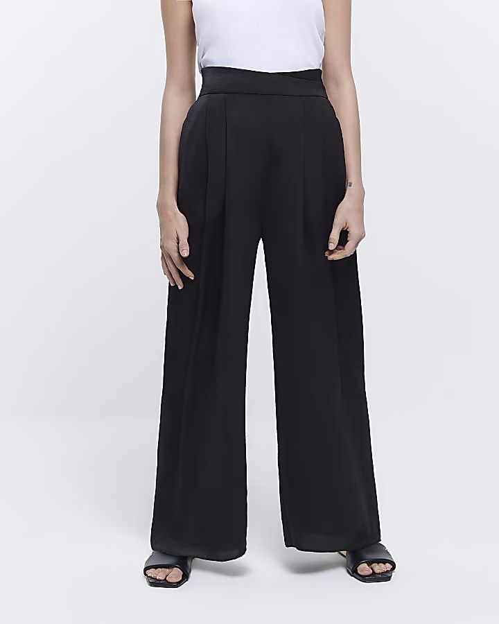 Petite black wide leg trousers | River Island (UK & IE)