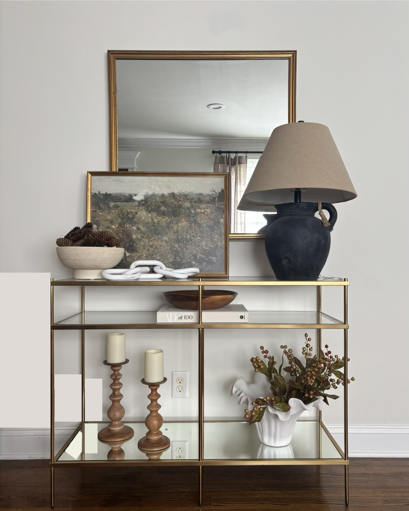 swipe ➡️ to see this console table styled 3 ways 🪞

All looks are very similar in colors & materials:
- Neutral, earthy colors throughout (brown, white, & black)
- materials found in nature like warm wood tones, textured ceramic, antique brass metal, linen, jute, wicker/woven, & life-like greenery/stems!

🫶🏻 which look is your favorite? 
Comment #1, #2, or #3 below ⬇️

#LTKSeasonal #LTKHome #LTKHalloween