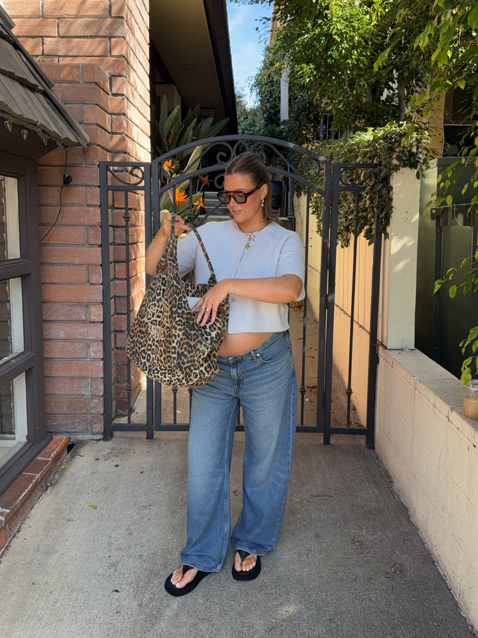 Size large in sweater from free people I love the pale blue. Wouldn’t be cropped much if I wasn’t pregnant so it’s very versatile! Madewell jeans are so good they have a stretchy rigid denim fit so flattering. I’m 20+ weeks and size 31 up two from my usual size but they have lots of room. Size down I think one size for a more accurate fit! 

#pregnant #bresheppard #madewell #lowrise