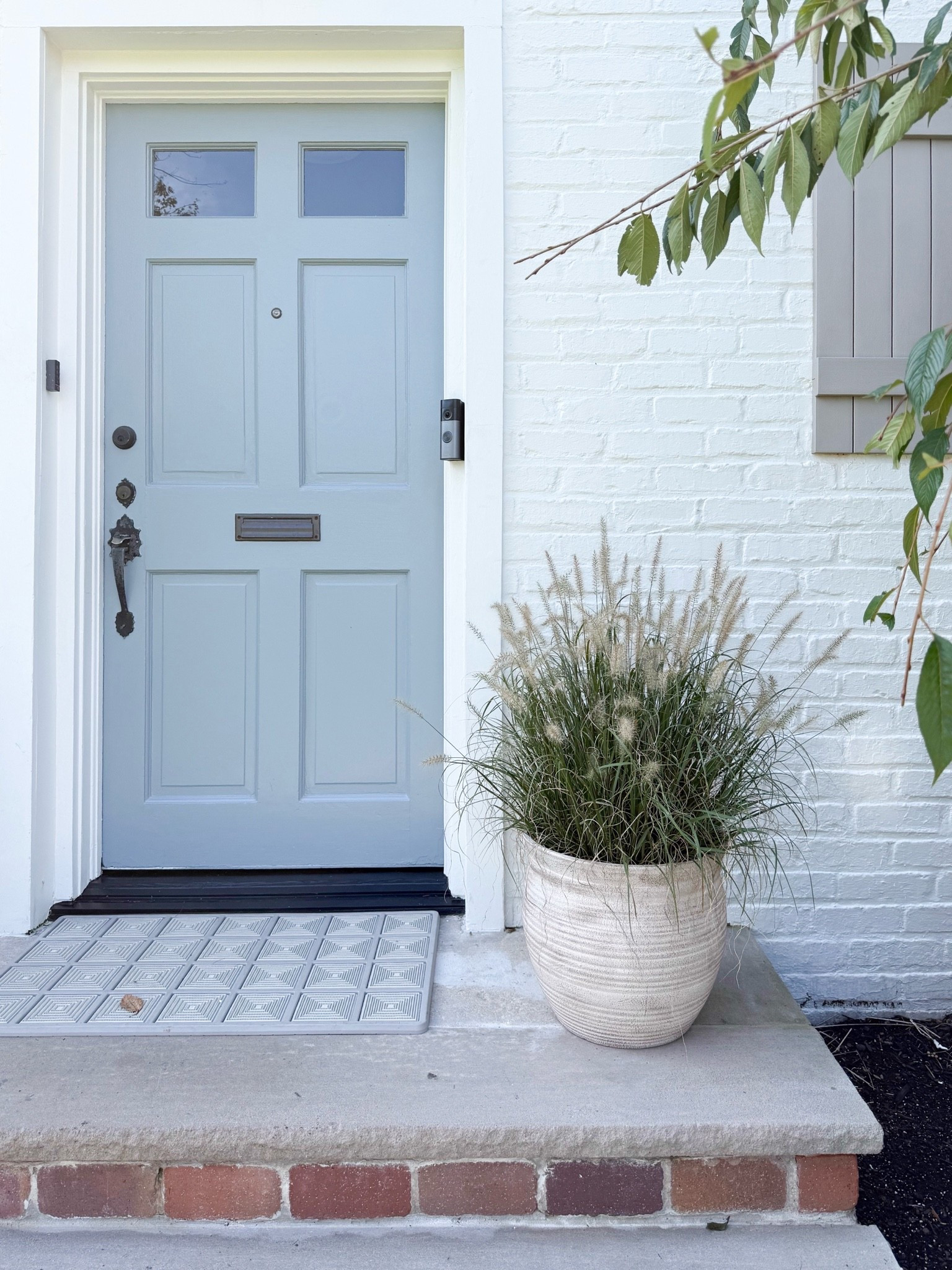A simple front porch moment that feels fresh and timeless. The textured planter, soft greenery, and classic blue door create a welcoming entry that works beautifully through the changing seasons.

front porch decor, entryway ideas, outdoor planter, front door inspiration, outdoor home decor, porch styling, neutral exterior decor, modern coastal home, curb appeal ideas, outdoor accents, seasonal porch decor, girlonthehudson

#LTKHome #LTKSeasonal #LTKdayinmylife