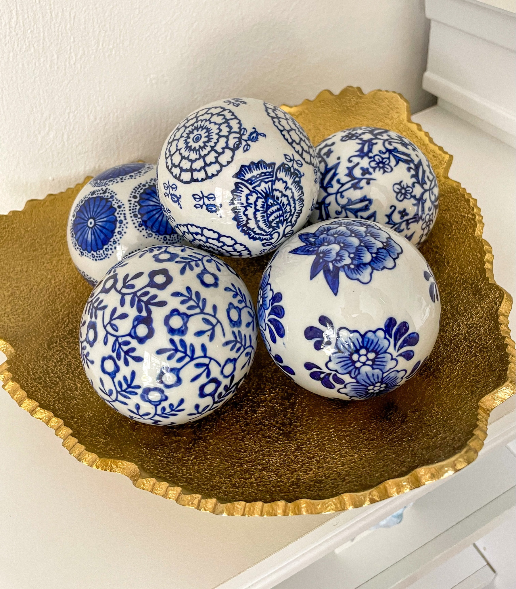 Arranged these beautiful blue and white antique porcelain balls in this unique gold plate and the result is simply stunning! #amazonhome #founditonamazon

#LTKhome