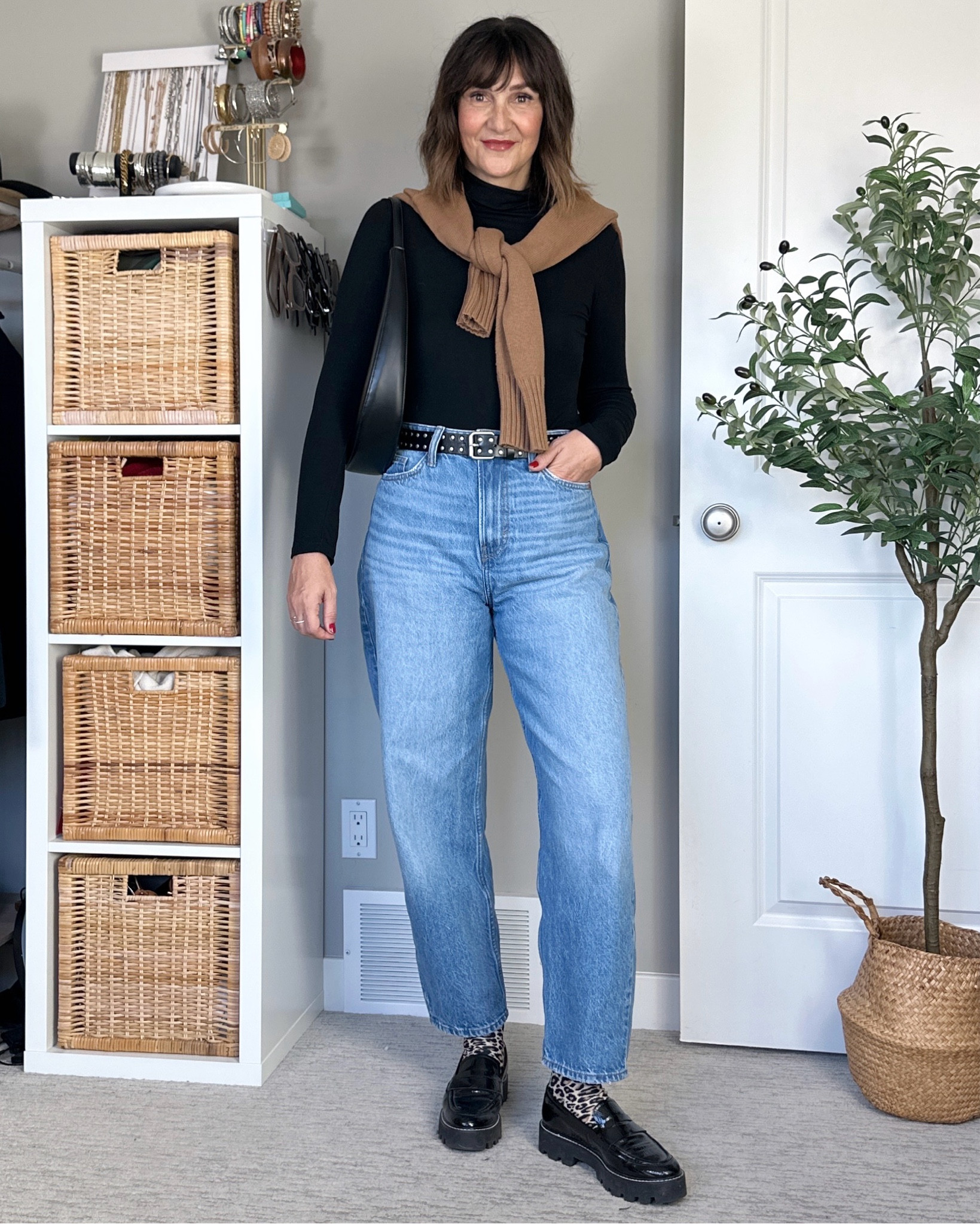 What I wore to a shopping event last week. I’m 5’ 7” size 4ish wearing size 4 in the barrel leg jeans and I sized up to M in the fleece turtleneck for more sleeve length. 
My camel sweater, studded belt  and platform loafers also fit tts. Also linked my leopard socks and black bag plus the other bag and burgundy socks and sweater I considered.


#LTKItBag #LTKStyleTip #LTKShoeCrush