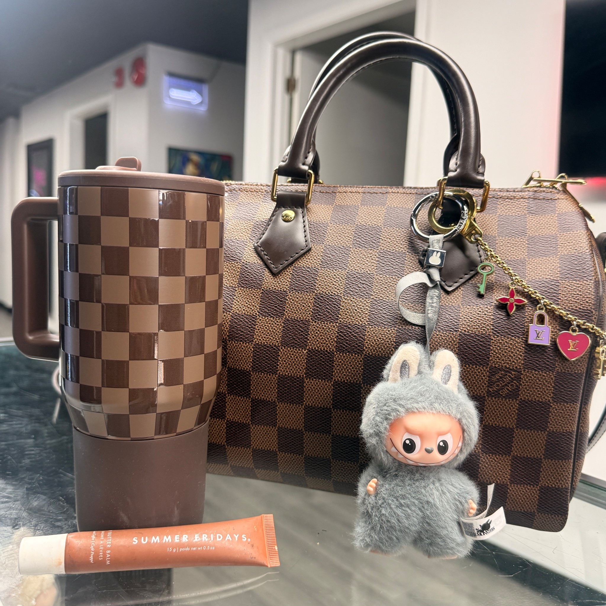 “Obsessed with my 20oz HydroJug Tumbler in the autumn checkers pattern 🍂🖤 Not only does it keep my drinks cold all day, but it matches perfectly with my Damier Ebene LV bag 👏 

#LTKItBag #LTKFindsUnder100 #LTKSeasonal