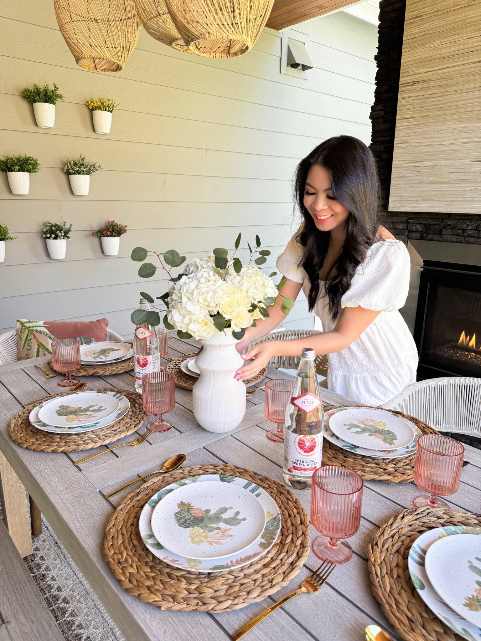 Outdoor dining table and dinnerware, outdoor chairs and rug, acrylic ribbed cups, lanterns, hanging planters 

#LTKhome #LTKparties #LTKSeasonal