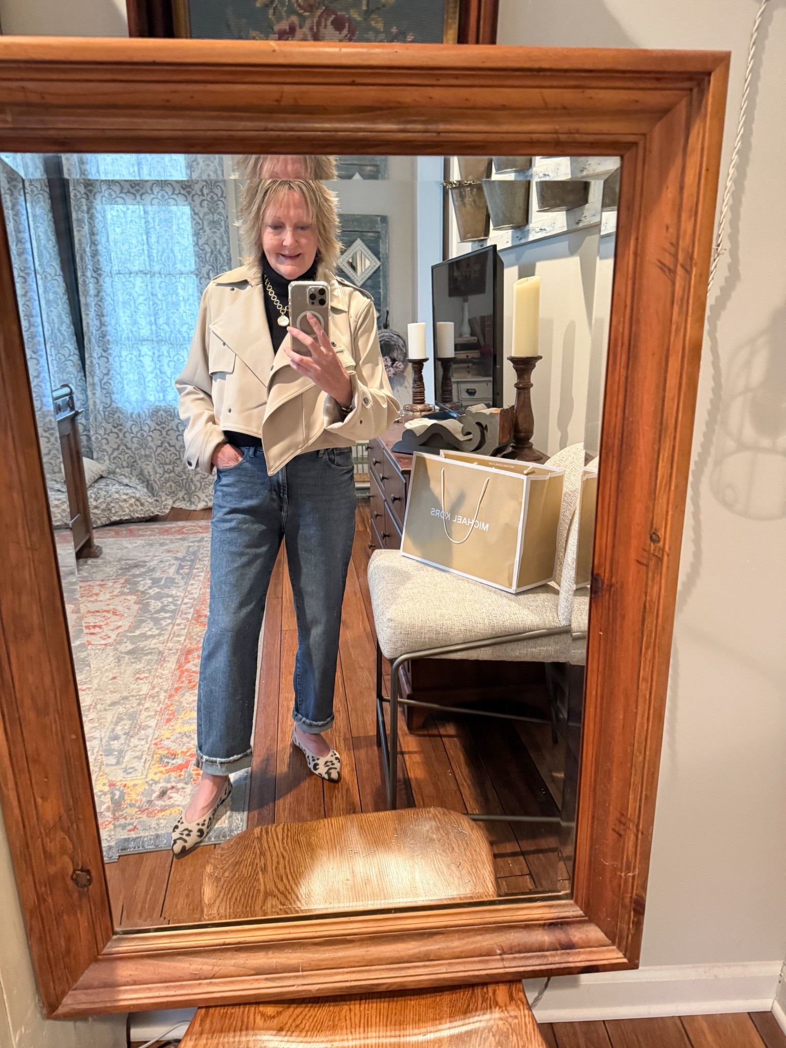 Comfortable distressed jeans with animal print flats and cropped trench jacket for a casual evening out at any age  

#LTKOver40 #LTKShoeCrush #LTKStyleTip