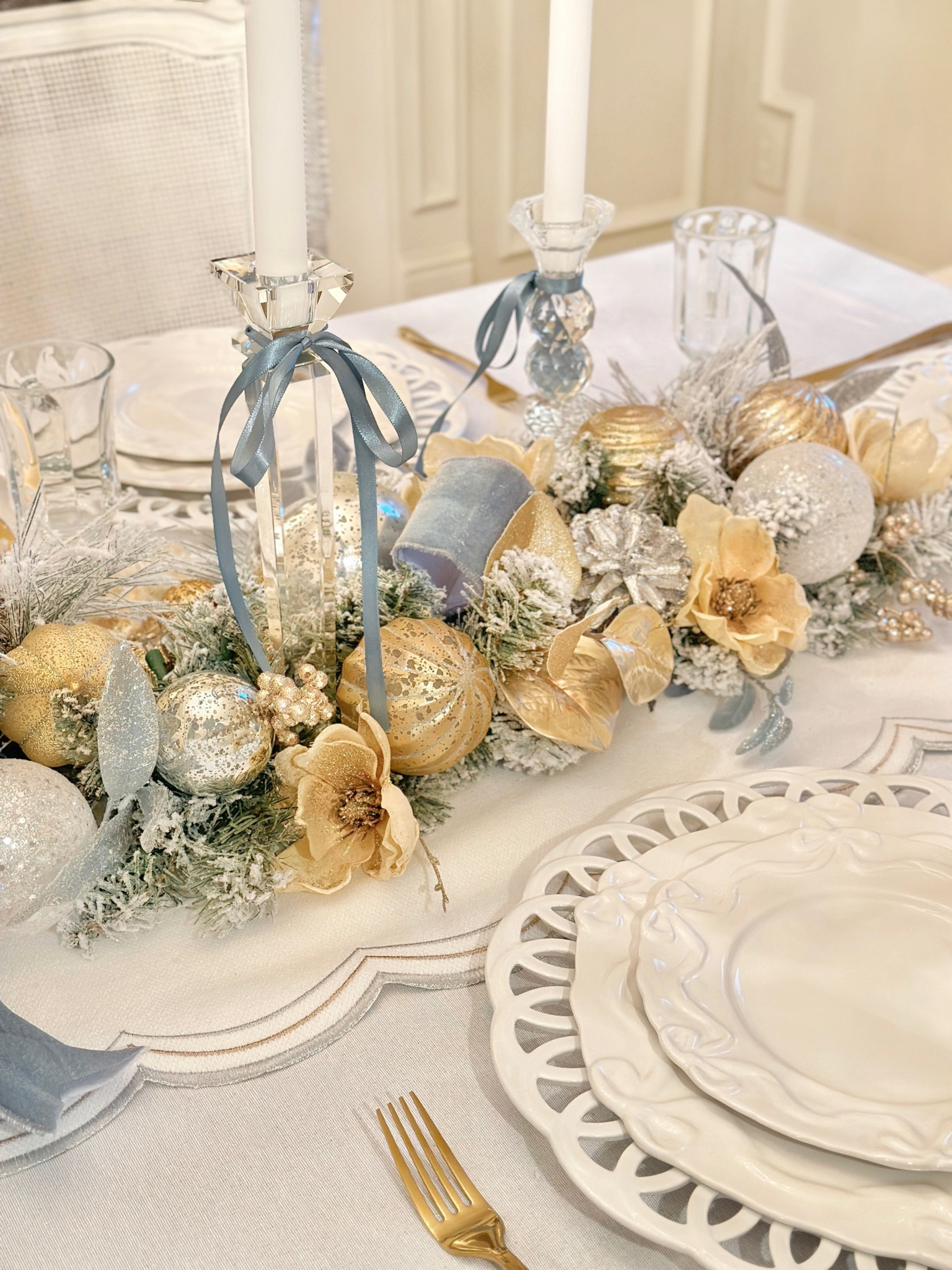 Christmas tablescape, flocked garland, dusty blue ribbon, crystal candlesticks holiday entertaining Christmas decor dining room scalloped runner looped plates bow plates 

#LTKHoliday #LTKSaleAlert #LTKHome