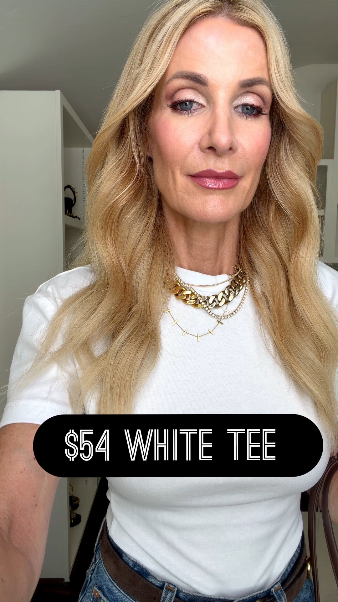 The perfect white T-shirt does exist! The cinched waist creates such a flattering shape and instantly elevates this classic jeans-and-tee outfit. I’m wearing an XS in the tee and a 24 in the jeans. #WhiteTee #DenimStyle #FashionOver40 

 #LTKgrwm #LTKSeasonal #LTKOver40