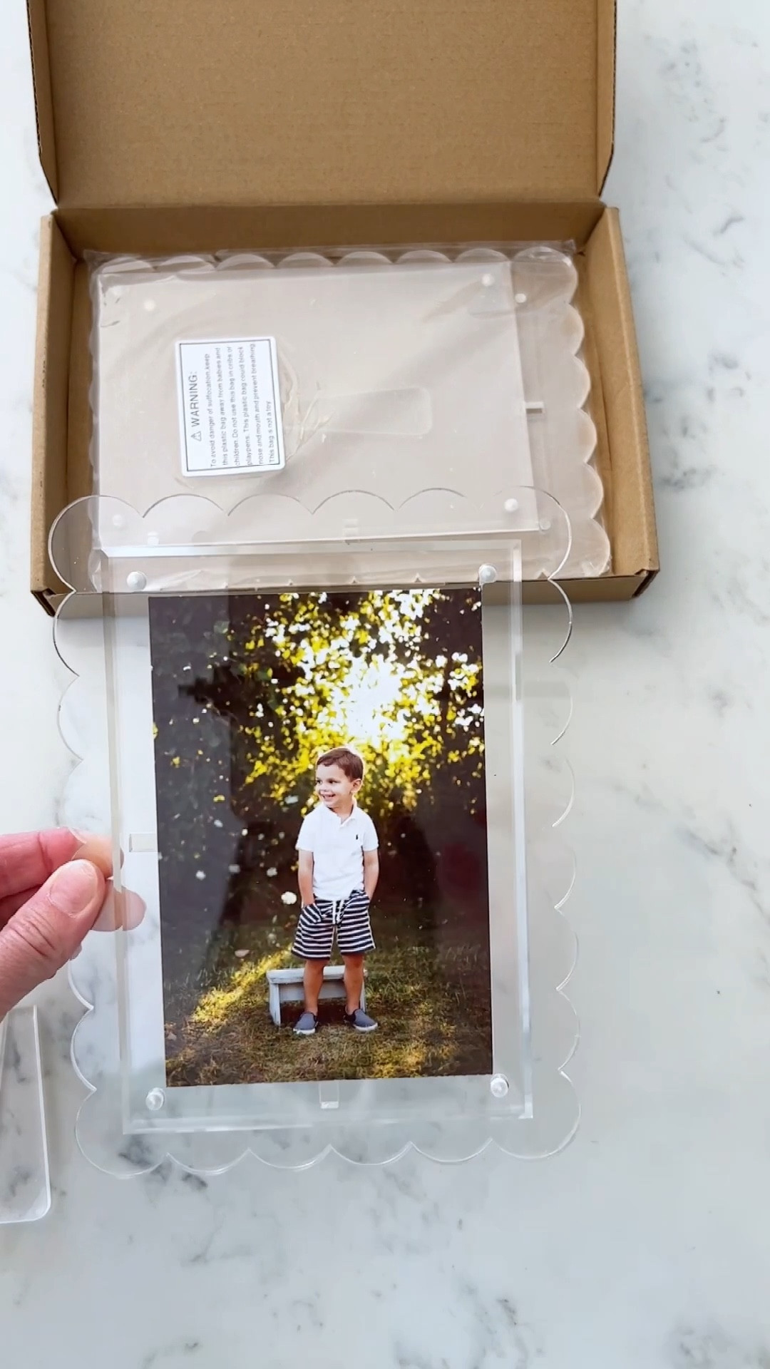 These scalloped acrylic frames are one of my favorite shelf styling pieces for a clean, layered, designer-inspired coastal look. I love mixing it with blue and white decor, rattan accents, and neutral accessories to style shelves and bookcases effortlessly.



#LTKSaleAlert #LTKHome #LTKU