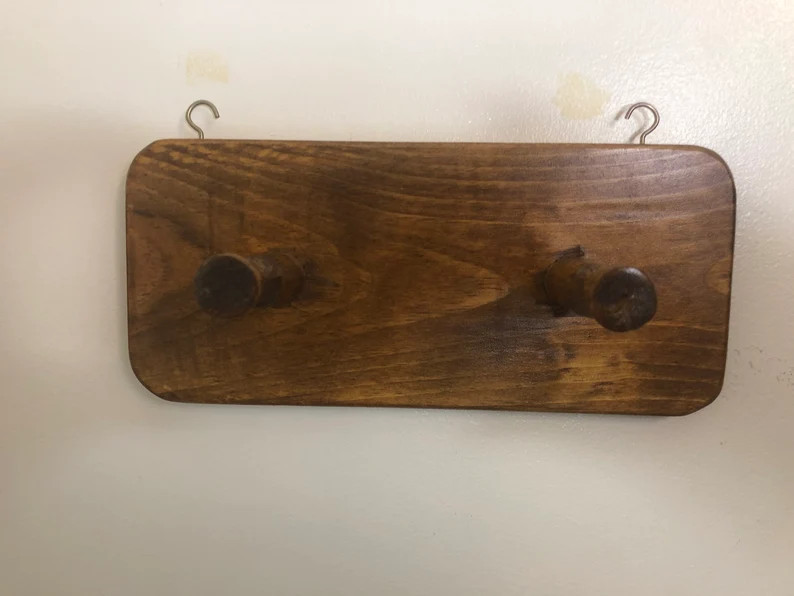 Two knob coat hangers. This hanger comes with two golden hooks attached as decoration, but also t... | Etsy (US)