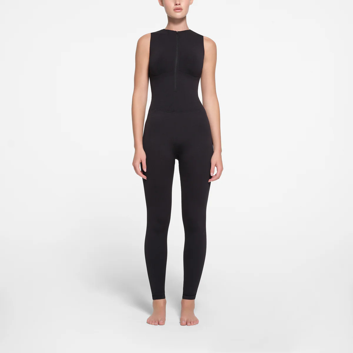 CONTOUR NYLON ZIP FRONT CATSUIT | ONYX | SKIMS (US)