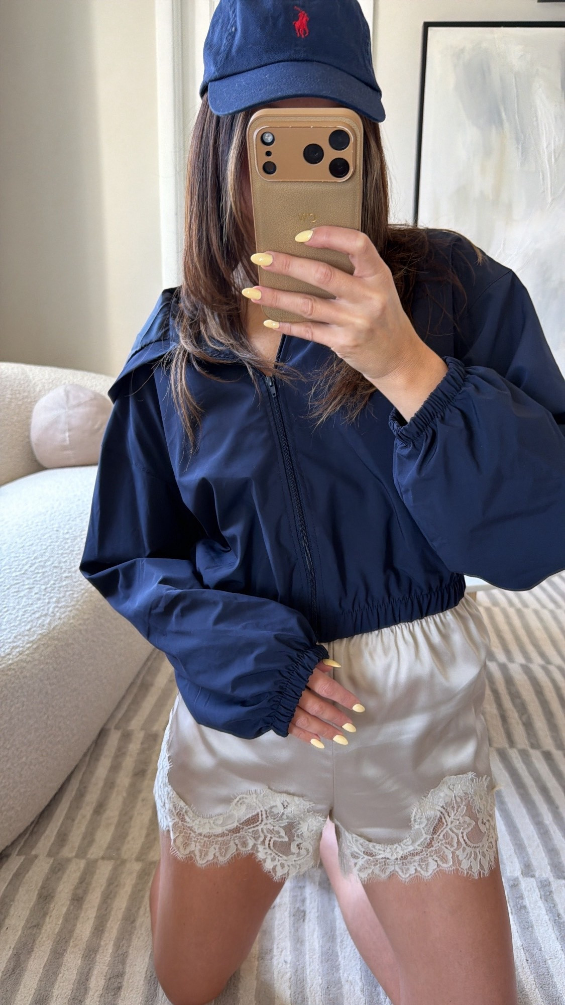 Navy blue windbreaker jacket, lace silk shorts, Ralph Lauren baseball cap, casual, trendy, Pinterest outfit.

#LTKootd #LTKSaleAlert