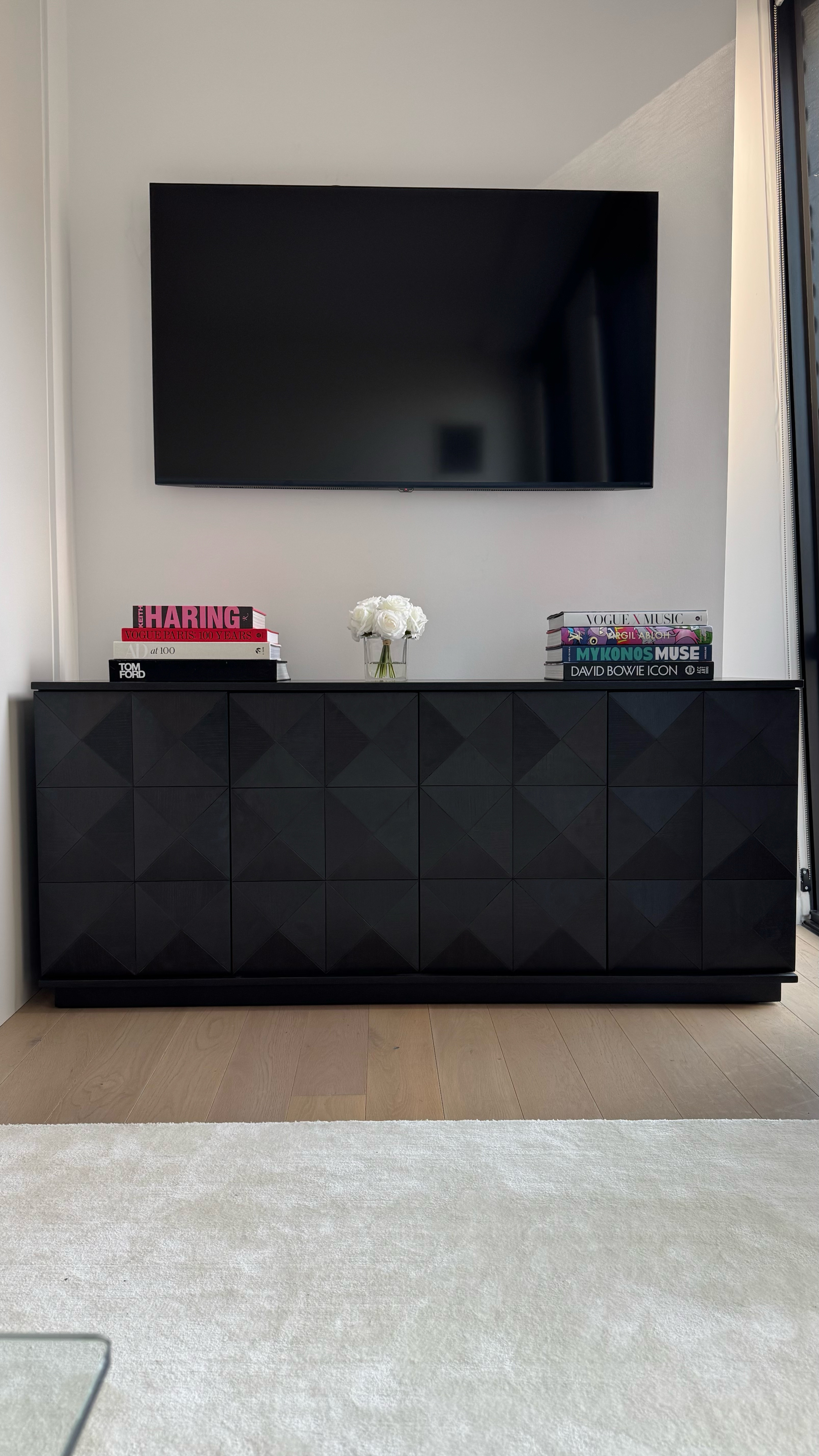 Shop my new sideboard (found it on sale!) for my living room—it’s got an incredible amount of storage, making it perfect for my New York City apartment. Plus, I’m linking the coffee table books I used to style it and the faux flower bouquet I found on Amazon!

#LTKSaleAlert #LTKHome