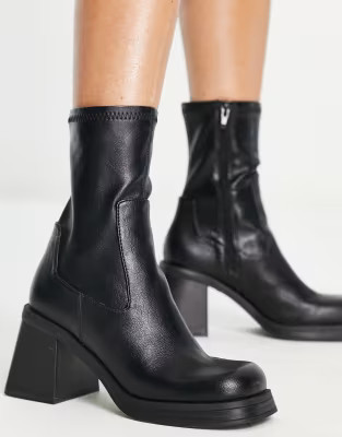 ASOS DESIGN Reversed mid-heel sock boots in black | ASOS (Global)