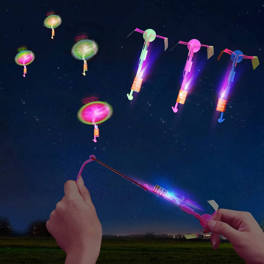 25 Sets LED Flying Set, 25 Slingshot+25 Glow Helicopter-50 Pcs, Flying Toy Outdoor Toys Glow in T... | Amazon (US)