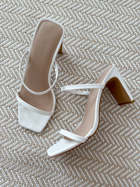 Love these white heels! The straps are so elegant and the heel is super comfortable! Wedding shoes // spring sandals // summer sandals // dressy heels // white heels // white sandals // event shoes // Amazon finds 

#LTKshoecrush #LTKstyletip #LTKSeasonal
