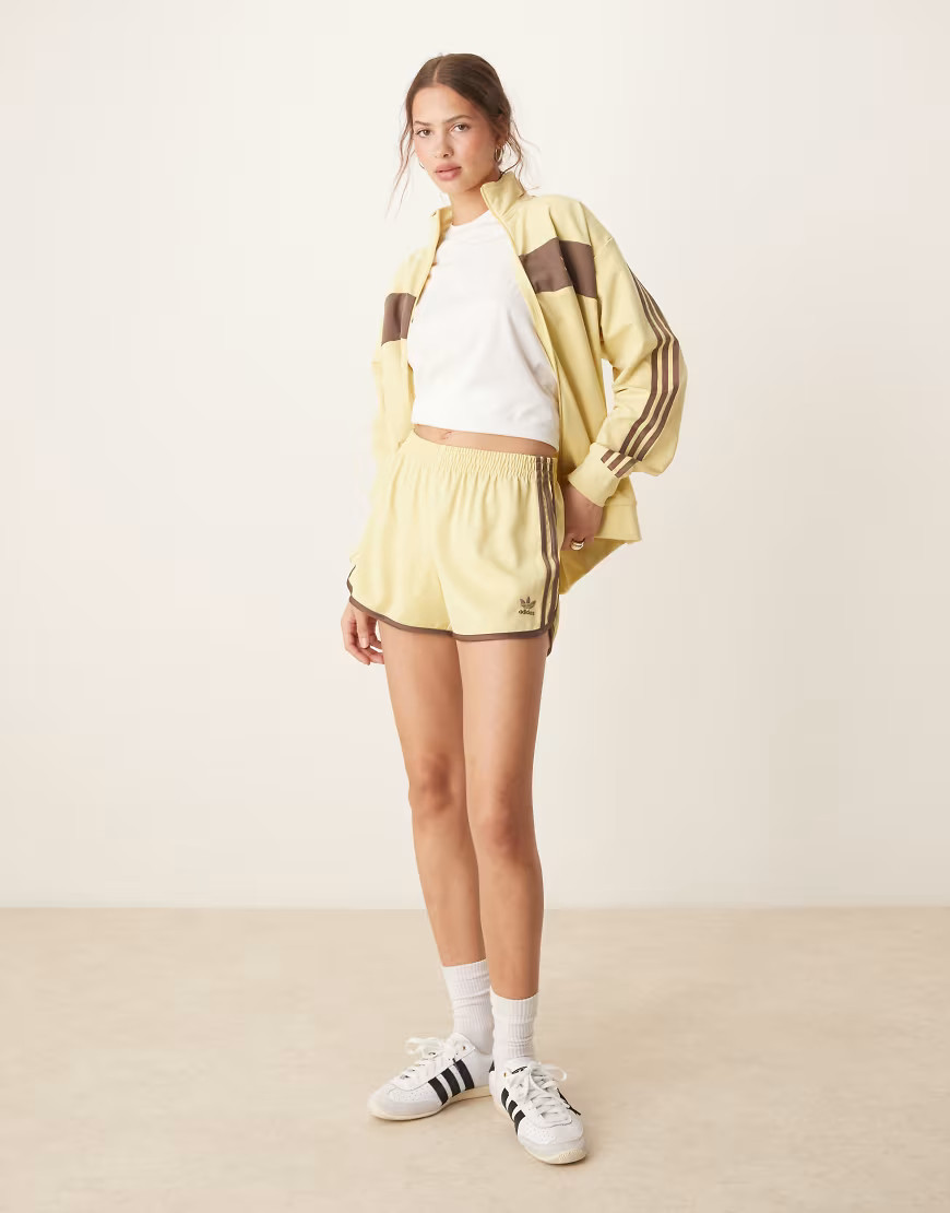 adidas Originals three stripe sprinter shorts in yellow | ASOS (Global)