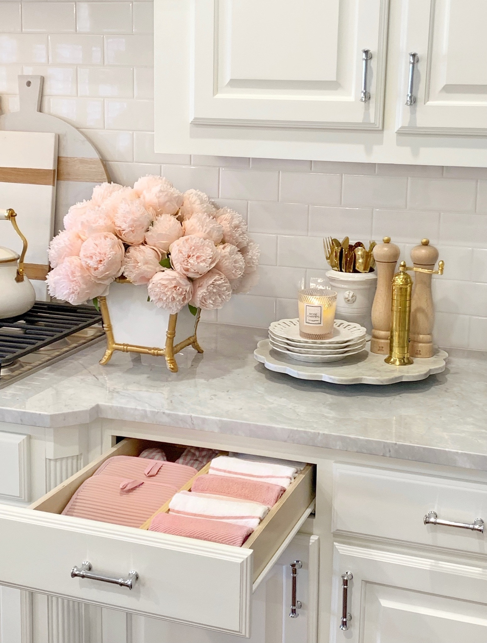 Spring kitchen organization, kitchen decor, spring decor, marble lazy Susan, gold pepper mill. Brass salt mill, pink kitchen towels, faux peonies, white and gold decor white kettle home decor 

#LTKhome #LTKsalealert #LTKunder50