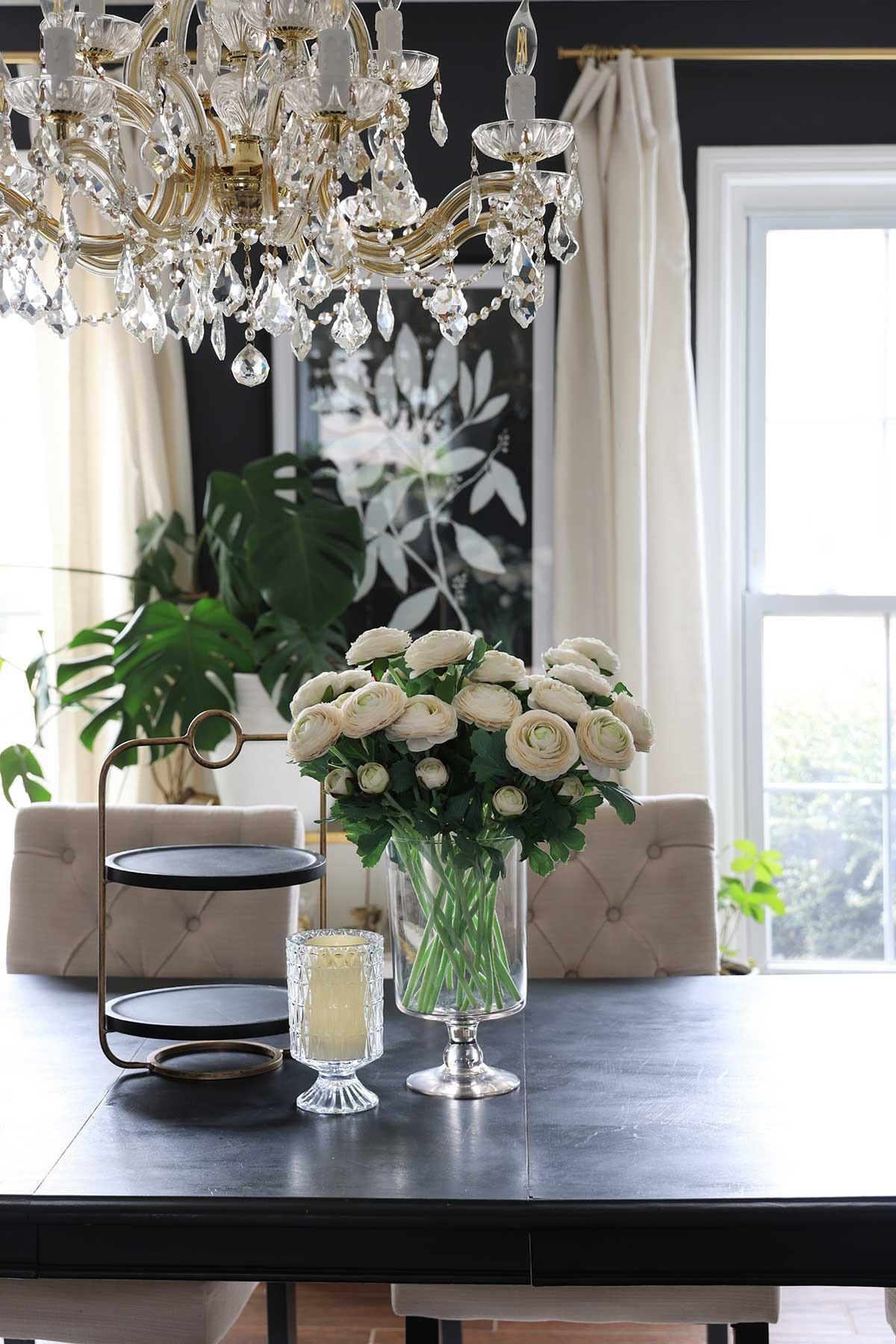 Dining room styling | artificial flowers, footed vase, candle holder, chandelier, tufted chairs, and more

#LTKHome