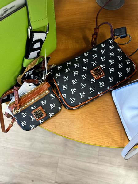 Awesome deal for this Dooney & Bourke crossbody set at TJ Maxx! Just in time for baseball season!!⚾️🤩 I found some more online, but can't beat this deal! Run to your TJ Maxx to find these first! I’m in California and that’s why the teams I found are these. Different states at TJ Maxx probably have different teams! 

🚨The 4TH OF JULY sale still on!! UP TO 50% OFF SELECT STYLES on popular Dooney & Bourke styles!
I don’t know why the images of links are not matching the item I’m linking. 
🚨Amazon finds up to 53% Off Dooney & Bourke bags!!



Summer sale, summer accessories, baseball fans, crossbody, Oakland A fans, San Francisco Giants fan, Amazon, qvc 


#LTKSaleAlert #LTKSummerSales #LTKItBag