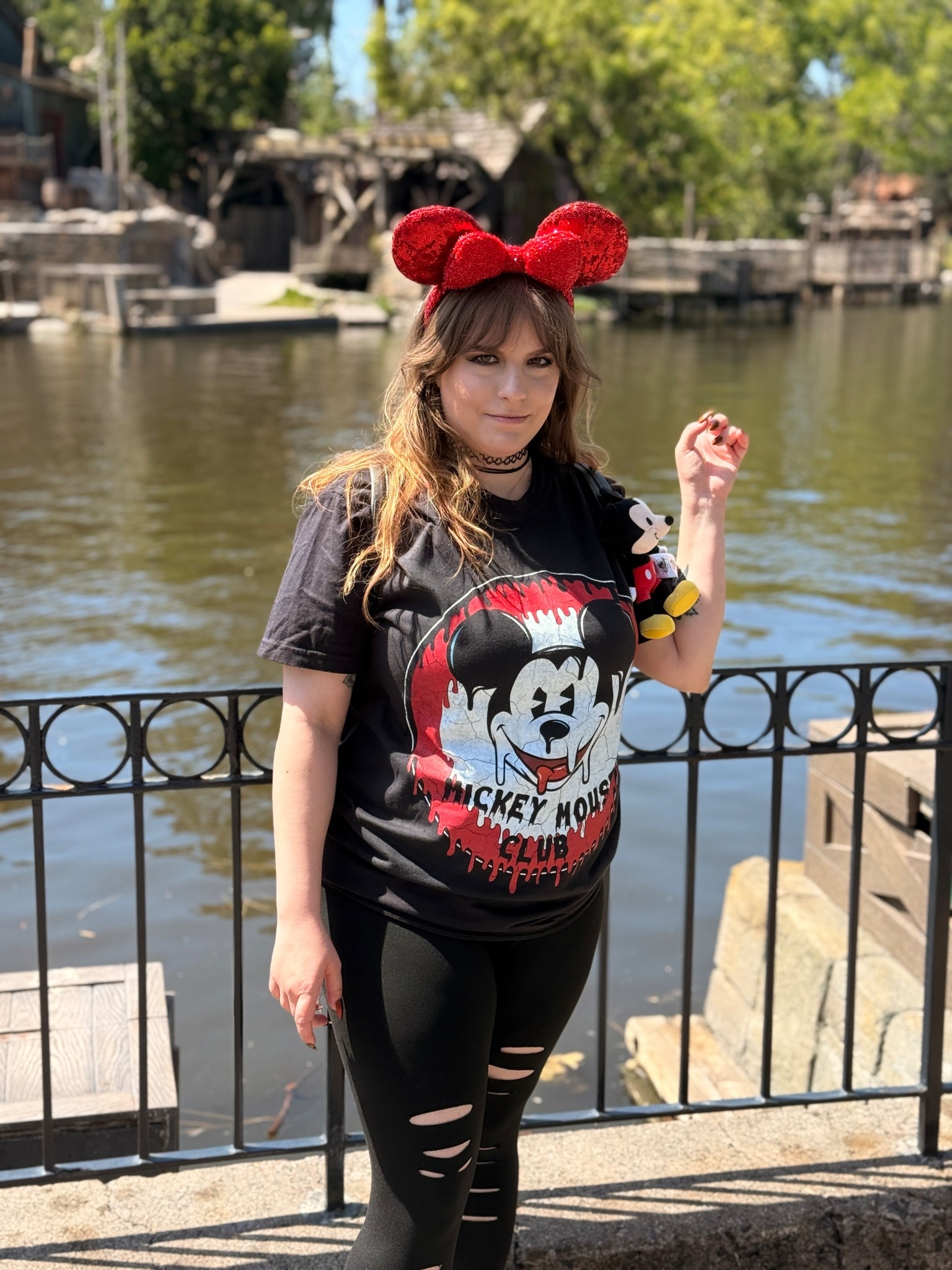 Melting Mickey Mouse club ♥️ 
Shirt is from hometown haunts- use AMANDA15 at checkout. 
Frontierland and the rivers of America is such a great photo spot. 

#LTKTravel #LTKdayinmylife #LTKootd