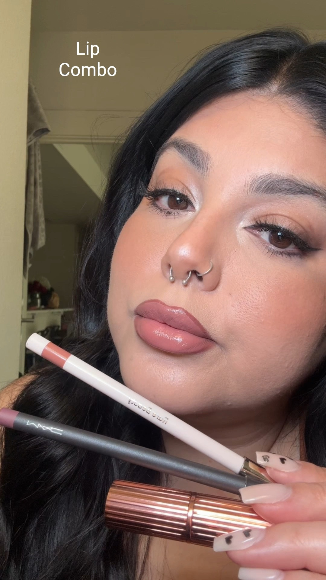 Lip Combo 

Using: 
Rare beauty lip liner ‘Wise’ 
Charlotte Tilbury lipstick ‘Pillow Talk Light’ 
MAC Cosmetics lip liner ‘Plum’ 



#LTKStyleTip #LTKBeauty #LTKU