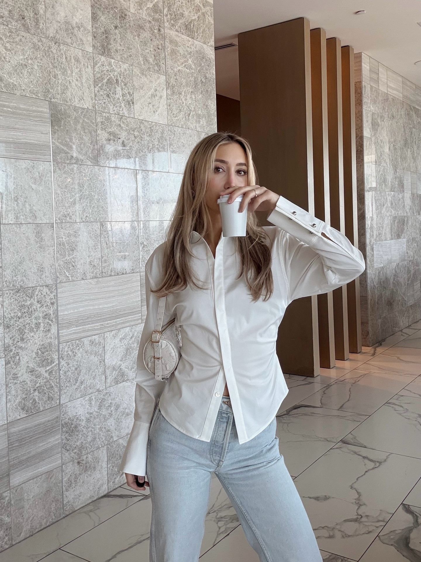 Stop everything, this is the most flattering button down / blouse you will find this spring. 🤍 #springoutfitideas 

#LTKootd #LTKgrwm #LTKOver40