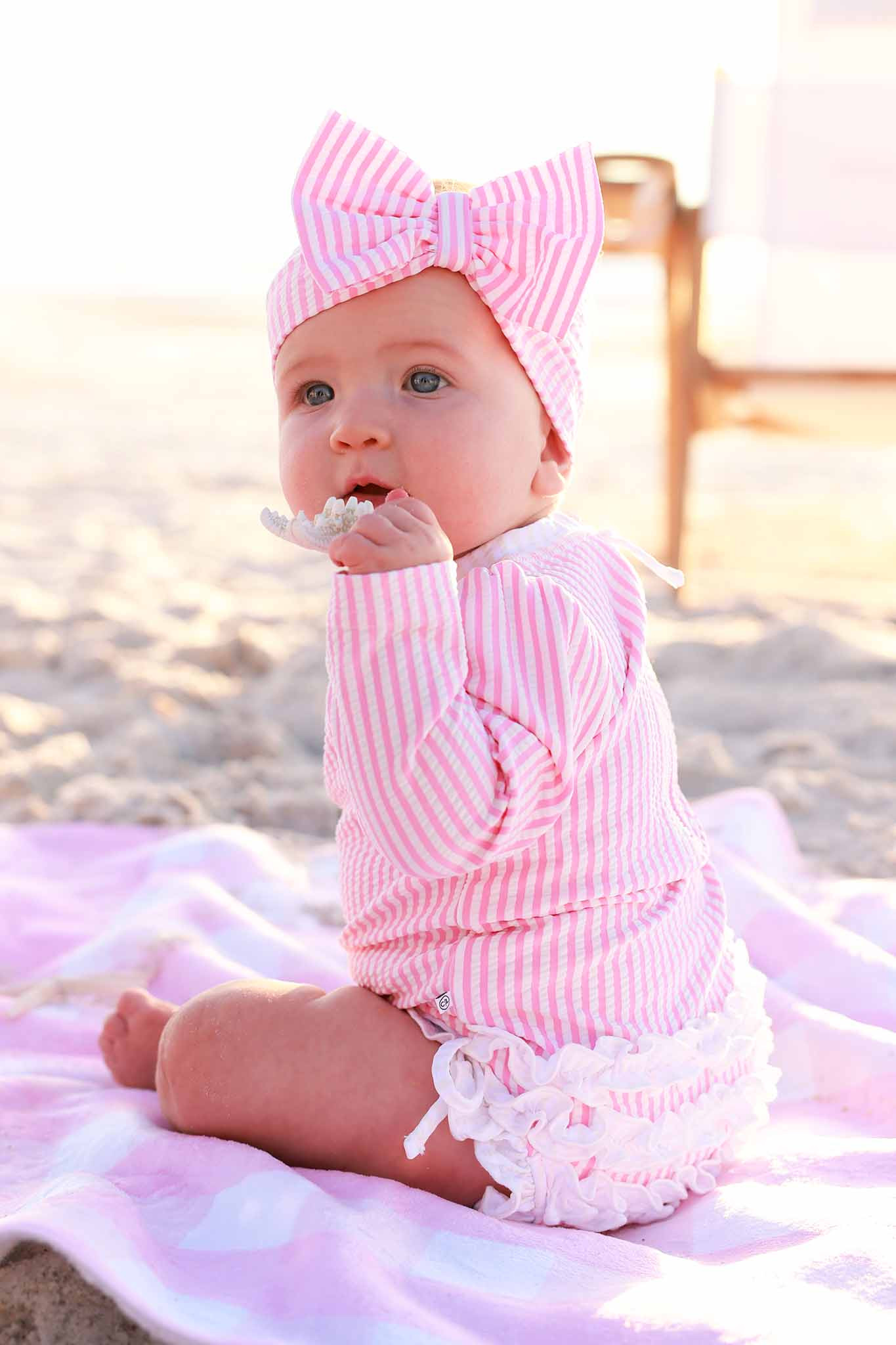 Long Sleeve Rash Guard with Ruffle Bottom | Seersucker Dusty Pink | Caden Lane