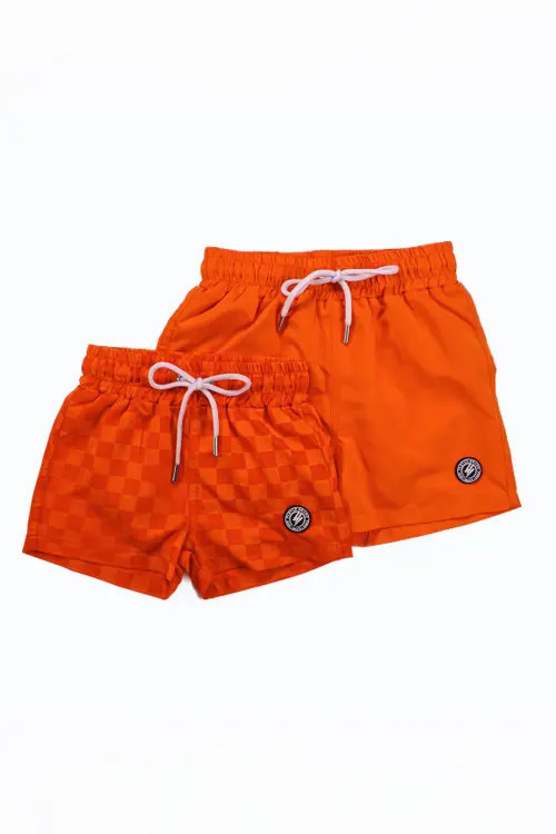 Fletch Neon Color Change Checker Swim Trunks in Neon Orange at Nordstrom, Size 6-12M | Nordstrom
