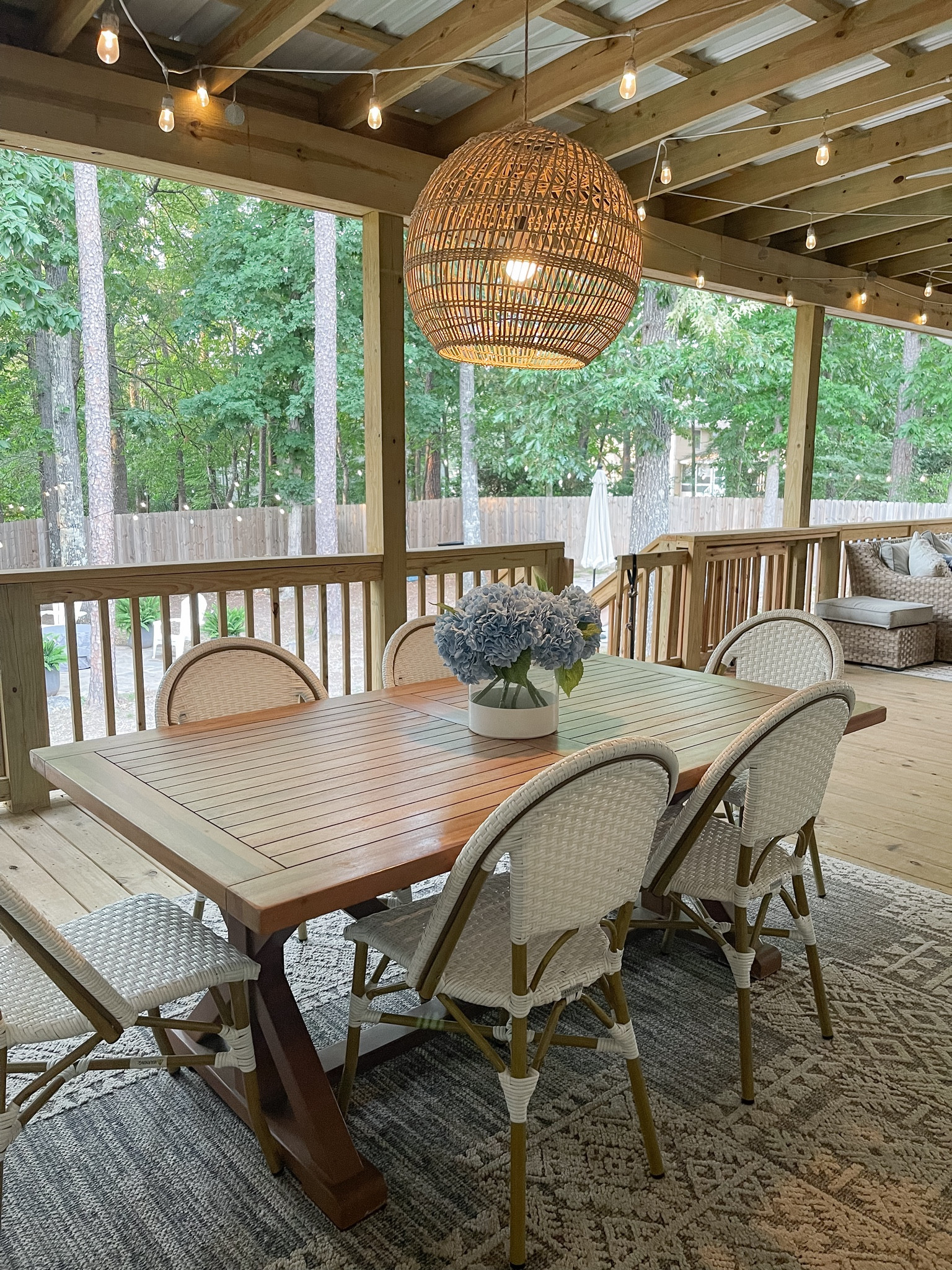 It’s still holding strong over a year later! 

My outdoor woven pendant oven my dining table- no wiring or batteries needed!!!

I installed this from the base of my outdoor fan- we definitely NEED the fan here in Alabama- but I really loved and wanted a pendant light over the dining table.

After a little planning and searching- I found exactly what I needed to get the look I wanted!!!

*NOTE: I later ended up spraying the woven shade with flexseal for  longer lasting protection from the heat and humidity. 

#LTKFamily #LTKHome #LTKSeasonal