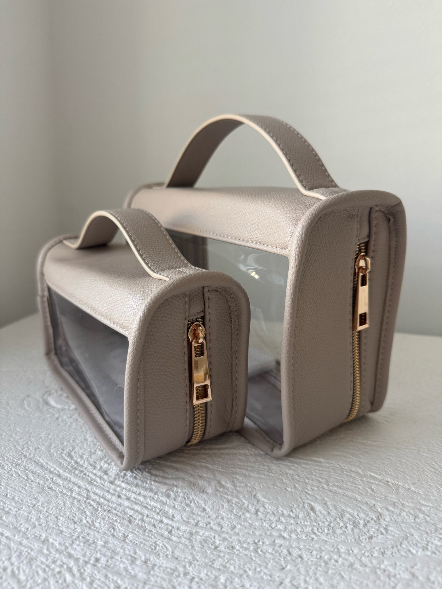 Travel Dupe! These toiletry bags look almost identical to my calpak toiletry bag, for a fraction of the price. Perfect for carrying lotions in a beach bag, organizing your liquids in your suitcase or storing your make up for daily use. They come in three great neutral color options! 

Travel, toiletries, vacation, luggage, carry on, daily dupe, target, target finds, target style, travel bags, make up bag, organization, pool bag, beach bag, tote bag

#LTKSeasonal #LTKSwim #LTKTravel