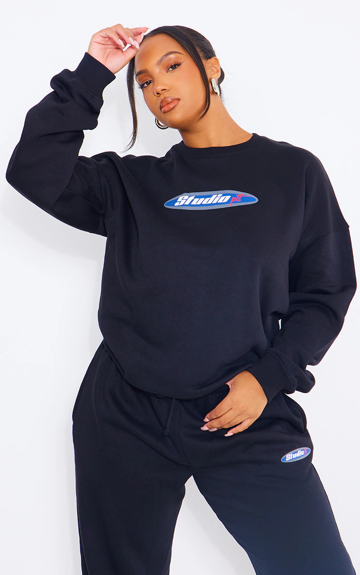 PRETTYLITTLETHING Plus Black Embroidered Studio Sweatshirt | PrettyLittleThing US