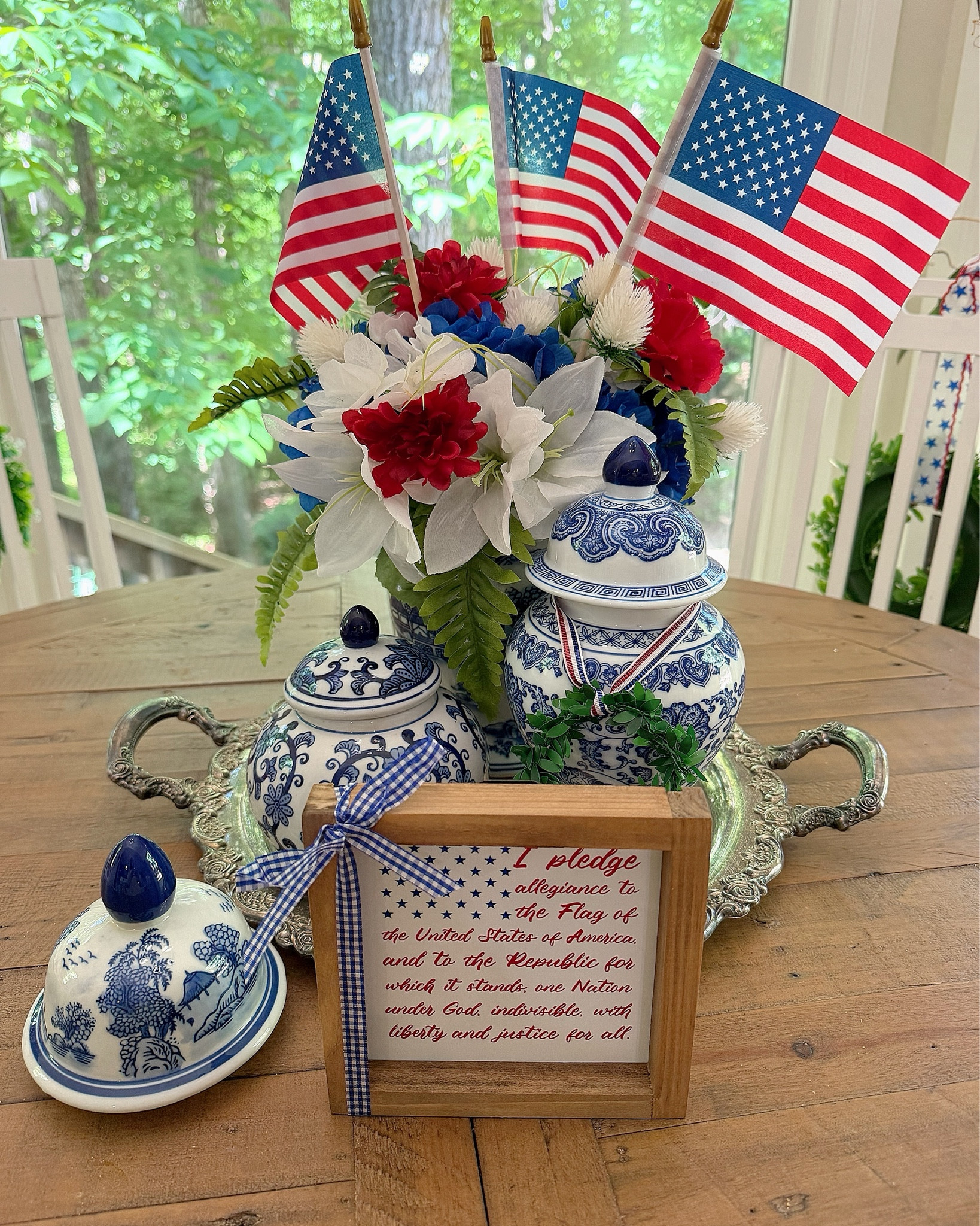 Patriotic Chinoiserie Tablescape 🇺🇸💙


Mixing classic blue & white chinoiserie with festive red, white, and blue for the prettiest patriotic setup 🇺🇸💙 I styled ginger jars, faux florals, and mini American flags on a silver tray for an easy centerpiece that feels elevated but still fun ❤️🤍💙 The sweetest touch is the framed pledge sign with a gingham bow—perfect for Memorial Day and Fourth of July hosting!

patriotic tablescape, chinoiserie decor, blue and white ginger jars, fourth of july centerpiece, memorial day decor ideas, red white and blue styling, summer entertaining, classic preppy home decor

#LTKfoodie #LTKHome #LTKmomlife
