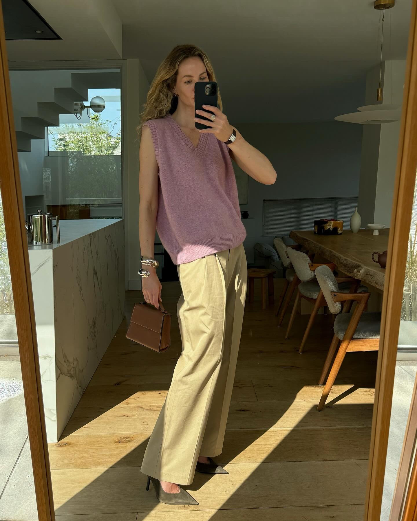 I don’t ‘do’ color I often say, but that’s actually not true. I don’t do harsh colors (minus swimwear), but I love muted colors with less intensity, because those are the colors that will match beautifully with all the neutrals in my closet. I’ve selected my favorite muted colors (petrol, mauve, dusty pink and army green) from @netaporter here are the credits: look 1 shirt & heels @jilsander trousers @toteme | look 2 knit  bracelet @maisonalaia bag @huntingseasonnyc | look 3 too @nililotan skirt @driesvannoten #THENETSET