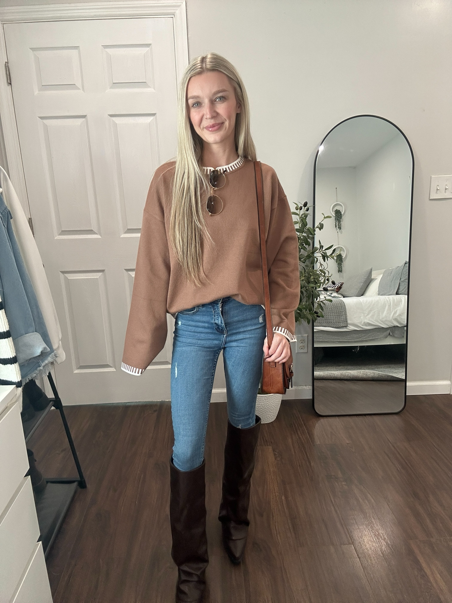 Love this sweater! How cute are the stitching details along the seams?! Wearing a small! 

#LTKSeasonal #LTKStyleTip #LTKFindsUnder50
