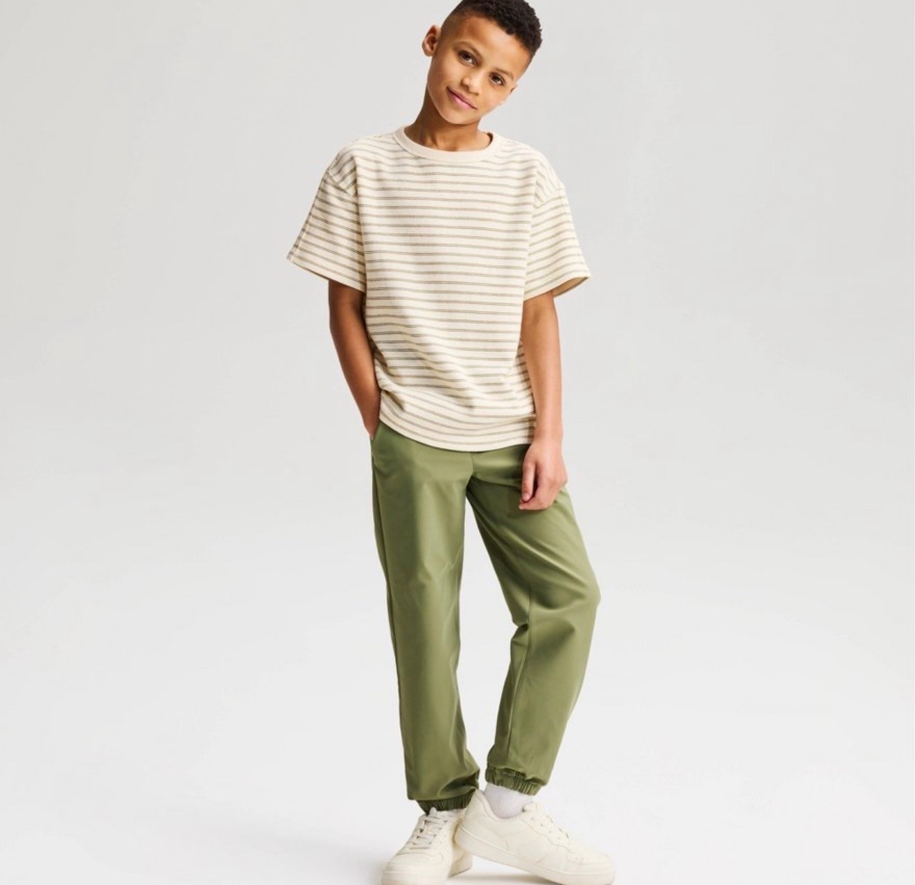 A classic striped tee for boys 🤎 This relaxed-fit T-shirt features subtle neutral stripes that make it easy to style with jeans, shorts, joggers, or chinos. A versatile everyday staple for school, weekends, travel, and casual days.

#LTKSaleAlert #LTKBaby #LTKKids