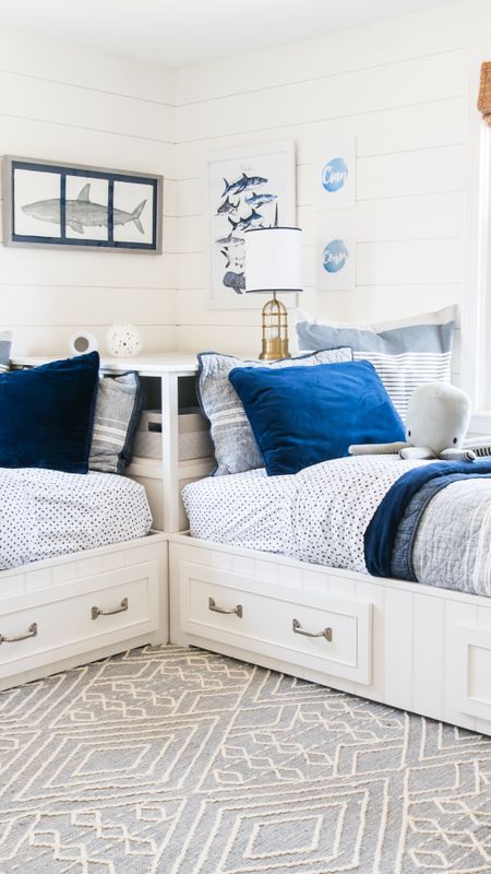 Coastal style boys bedroom, shared bedroom, storage beds, Pottery Barn for kids, blue and white bedding, nautical themed artwork kids bedroom

#LTKHome #LTKFamily #LTKKids