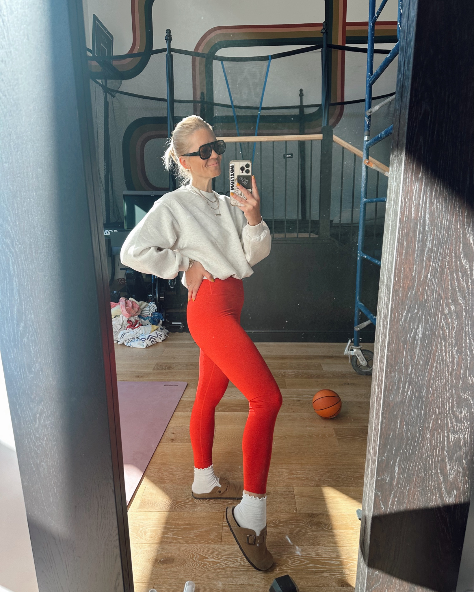 Butter red leggings & the most soft oatmeal colored bounce fleece - on sale. Also my go to sunnies, ruffle socks & clogs. The on-the-go but make it cute fit. 

#LTKSaleAlert #LTKOver40 #LTKWorkwear