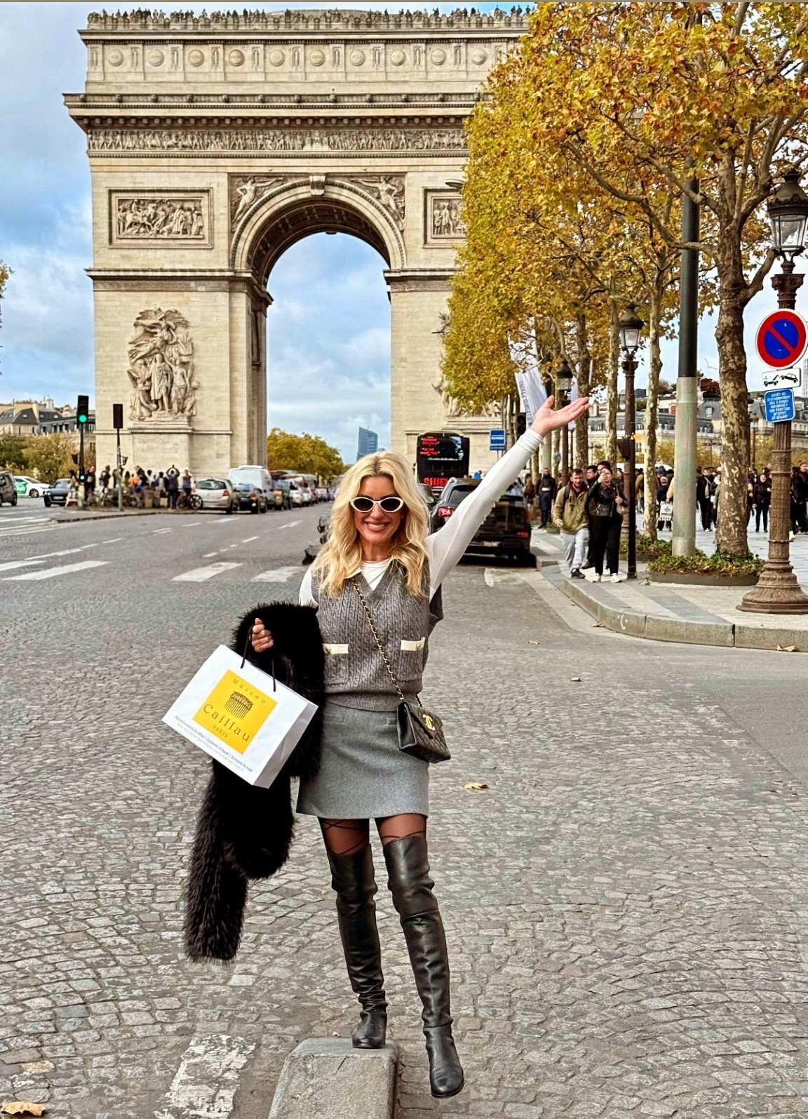 PARIS!!!  Sweater vests. Tights. Boots. Fur. Oh my! 