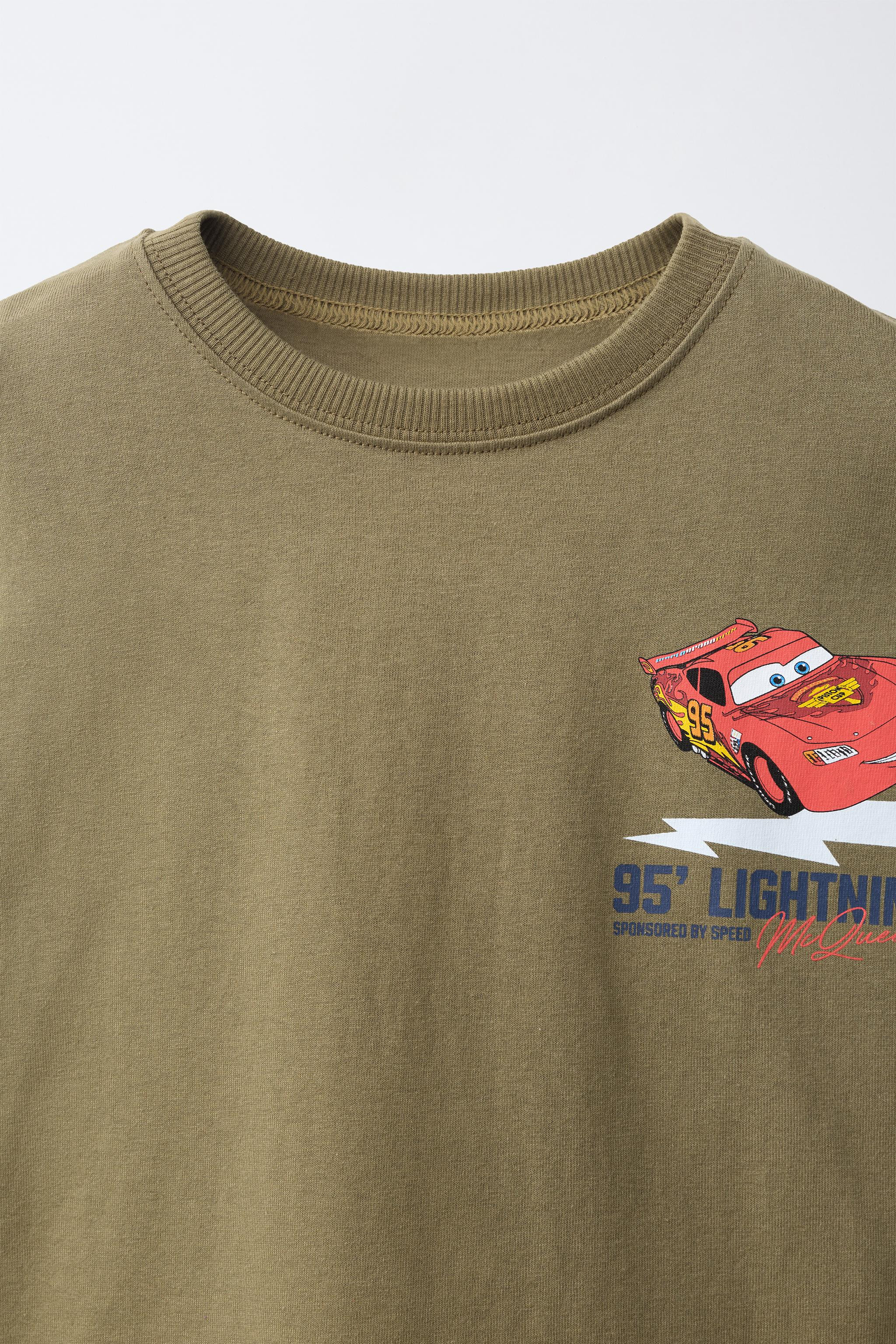 Short-sleeve T-shirt with a crew neck. Featuring a 'Cars Lightning McQueen' graphic print from Di... | Zara US