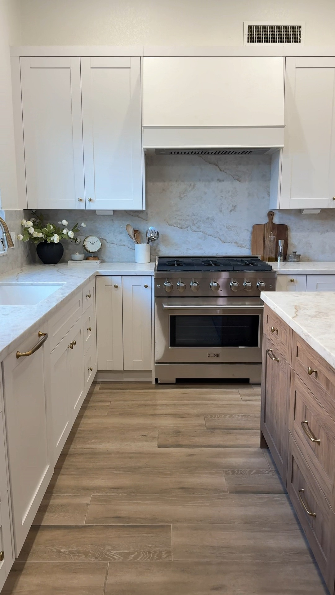 “I’m an artist” trend kitchen transformation!! I linked everything in my kitchen here! 
•
•
Updated kitchen, kitchen remodel, new kitchen, Taj Mahal counters, zline range, cream kitchen cabinets, neutral kitchen, organic modern kitchen, timeless kitchen design, kitchen decor, kitchen decor ideas, kitchen counter decor, kitchen island centerpiece 

#LTKHome