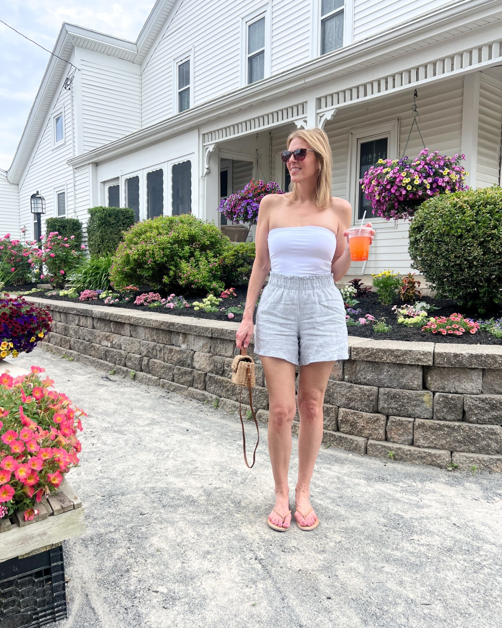 🍓☀️ Strawberry festival outfit! Lightweight shorts, a simple white tube top, and a straw bag for an easy summer look. 🤍👜✨

#LTKOver40 #LTKSeasonal #LTKootd