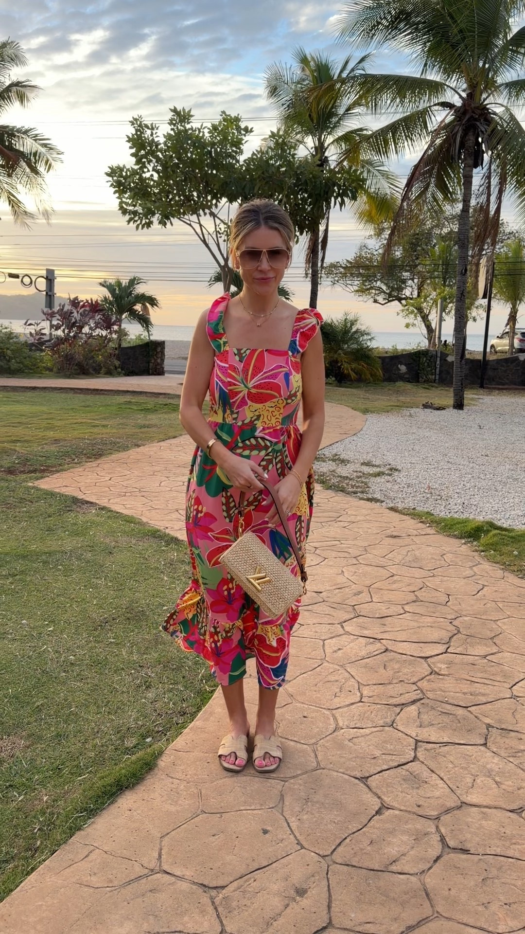 Costa Rica ☀️ 
Wore this cute little tropical Amazon dress for dinner! Size small 
Raffia sandals 
Raffia purse 
Miu miu sunglasses 

#LTKTravel #LTKootd #LTKOver40