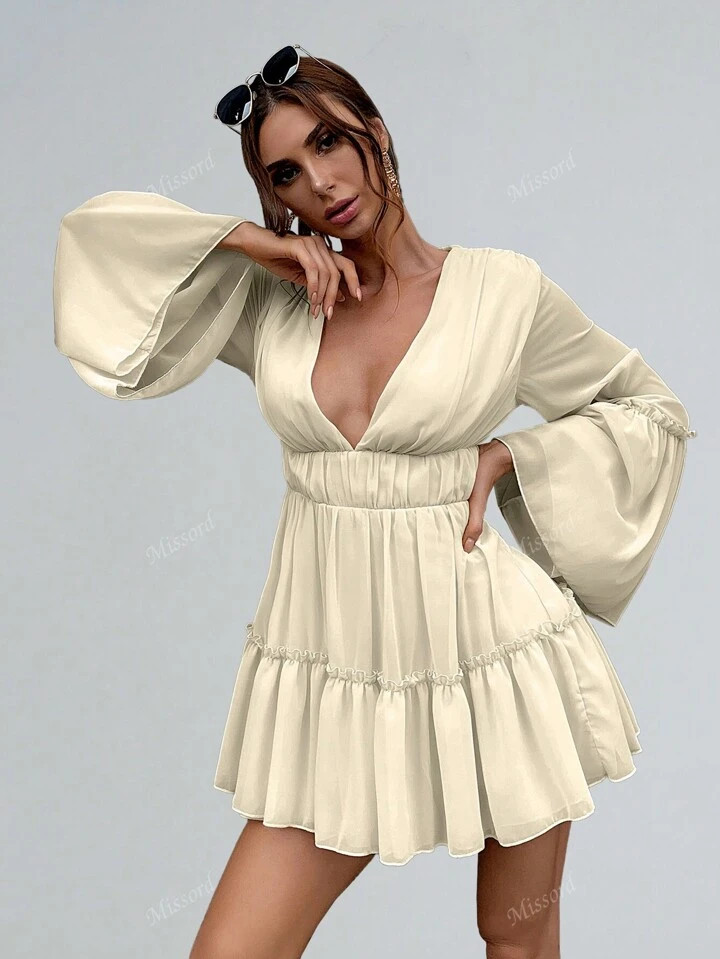 £15.99      
    £19.99
   
  -20%
        TrendsMissord Plunge Neck Frill Ruffle Hem Chiffon D... | SHEIN