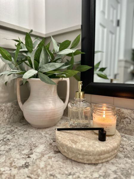 Bathroom Vignette. Follow @farmtotablecreations on Instagram for more inspiration. Bathroom Decor. Bathroom Styling. Trophy Vase. Green Stems. Marble Tray. Marble Riser. Soap Dispenser. Target. Studio McGee. Threshold  

#LTKFind #LTKunder50 #LTKhome