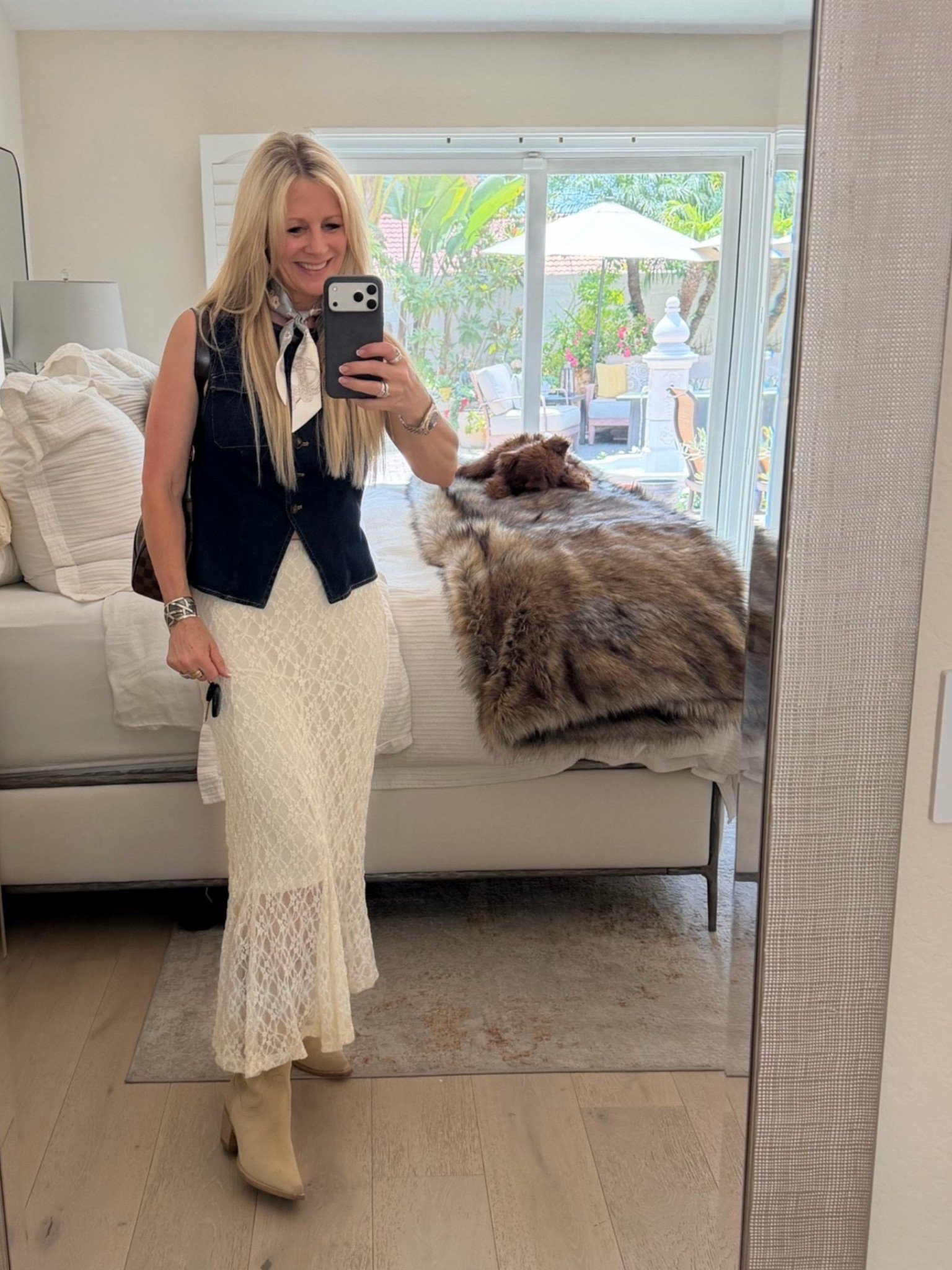 OOTD - I’m loving the boho vibe of lace maxi skirts paired with a denim vest and boots. So chic!

#LTKootd #LTKOver40 #LTKWorkwear