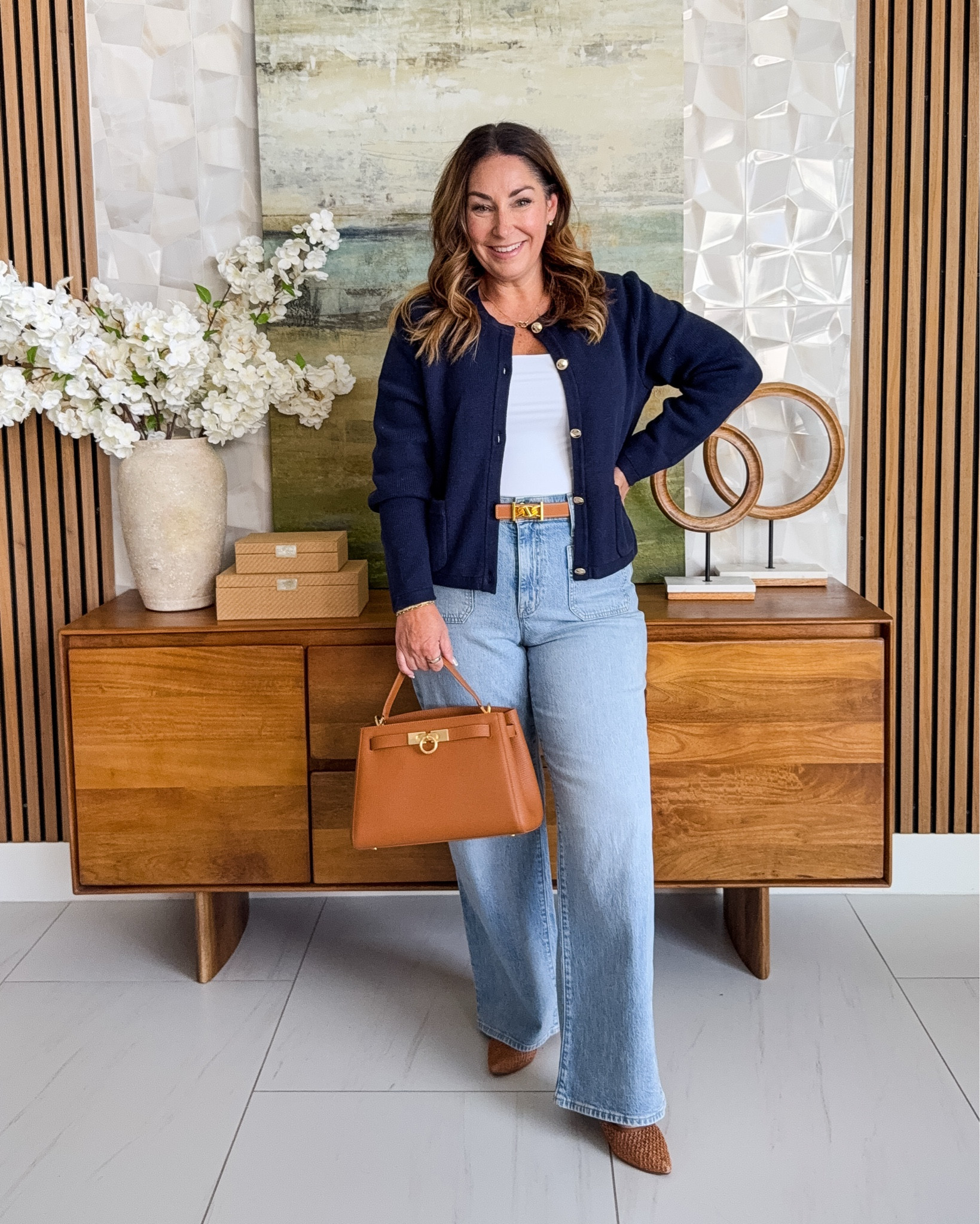 Summer sweaters are the perfect solution for a 🥶 office and this new navy version from Quince is such a great layering piece! It's thicker and a bit more structured than others plus love the gold button detailing.📏Wearing L in Sweater, Jeans in 12

#LTKOver40 #LTKMidsize #LTKWorkwear